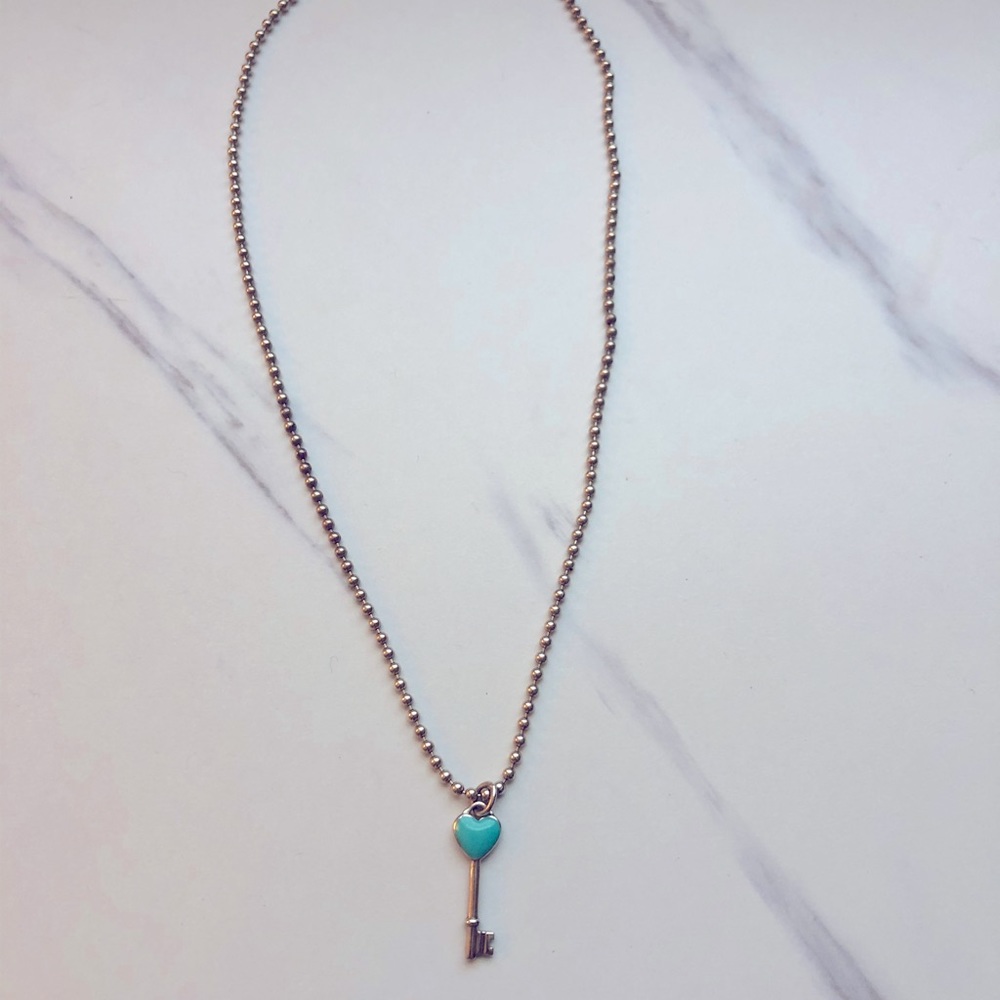 Authentic Tiffany’s Blue Heart/Key Charm Necklace.